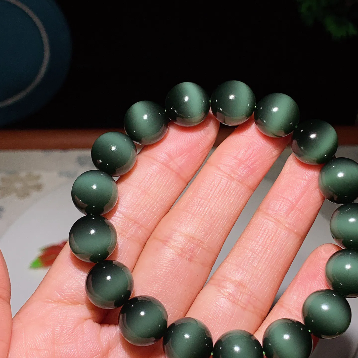 臻品收藏级新疆和田玉黑猫眼猫眼碧玉手串 一线天黑猫手串 单颗尺寸12！无裂无杂玉质细腻油润 底色纯净 脂粉好，品质好。lt250103