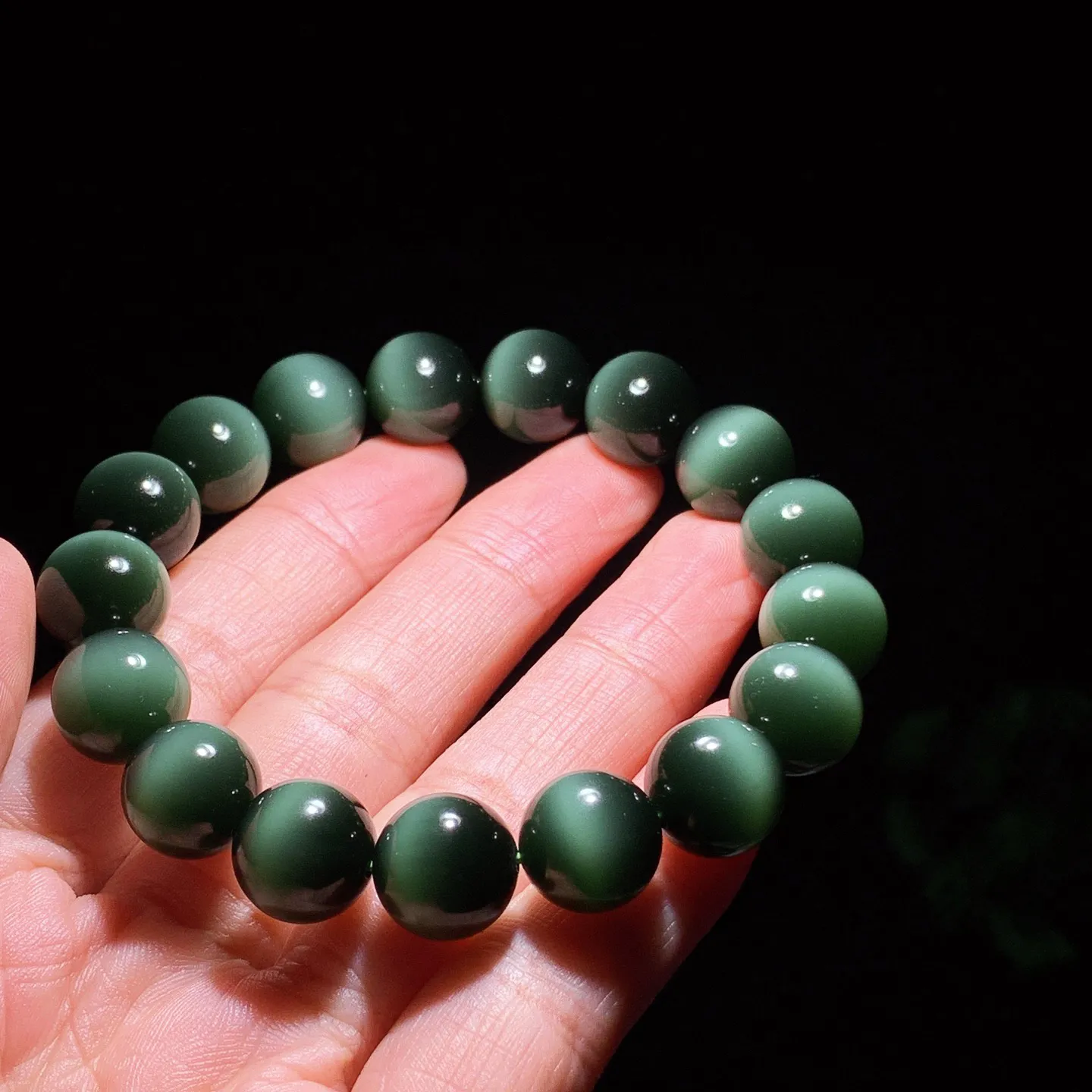 臻品收藏级新疆和田玉黑猫眼猫眼碧玉手串 一线天黑猫手串 单颗尺寸12！无裂无杂玉质细腻油润 底色纯净 脂粉好，品质好。lt250103