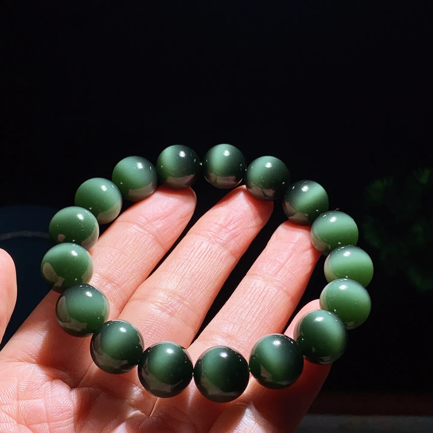 臻品收藏级新疆和田玉黑猫眼猫眼碧玉手串 一线天黑猫手串 单颗尺寸12！无裂无杂玉质细腻油润 底色纯净 脂粉好，品质好。lt250103