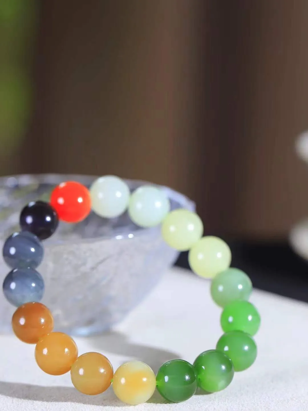 【多宝手串】

精选和田玉多宝手串，每一颗玉石都凝聚自然的灵气与岁月的沉淀，寓意福禄寿喜，守护您的平安与幸福。佩戴它，感受千年玉文化的温润与优雅。重45克  尺寸取一12mm  5617839A