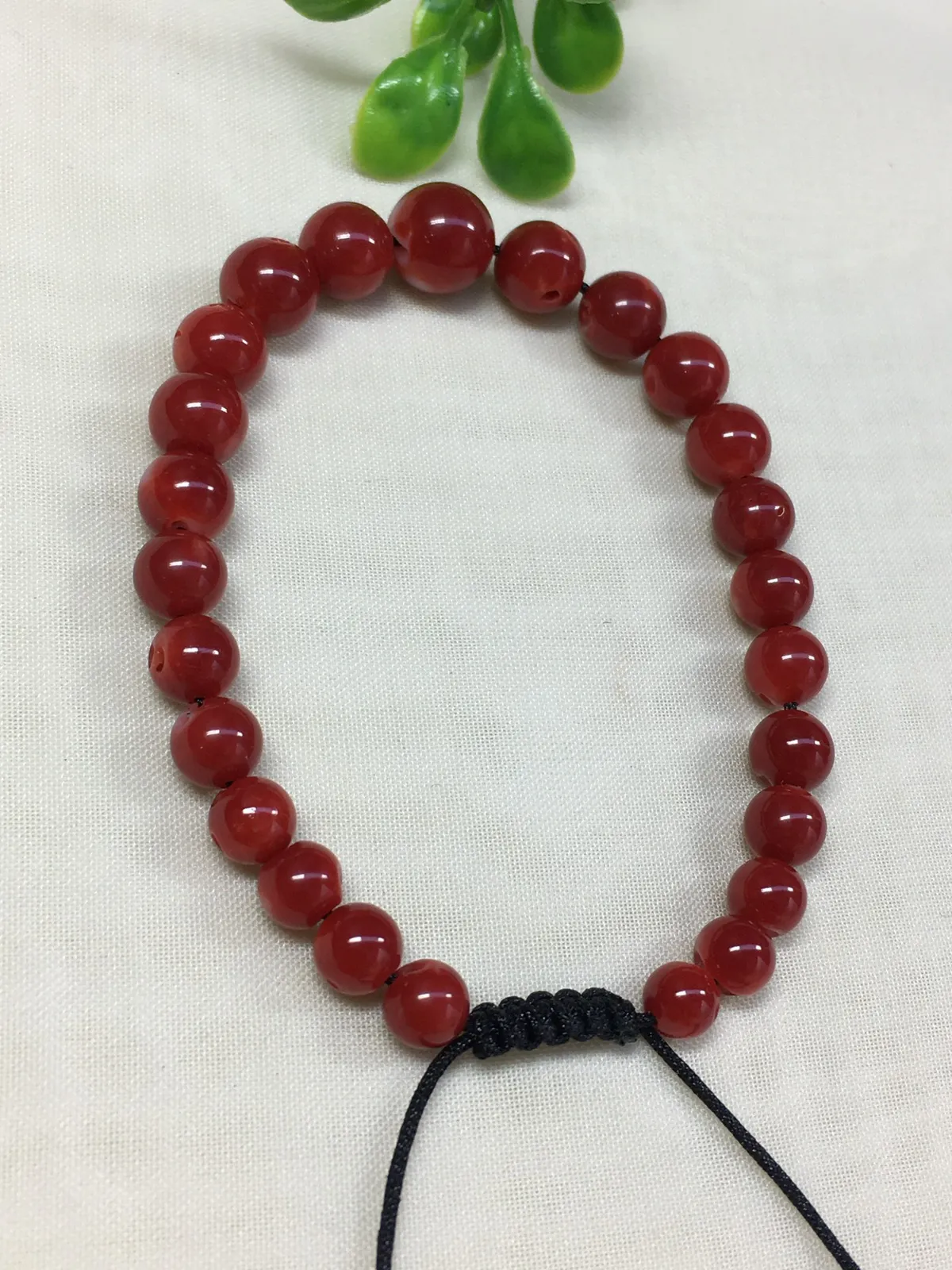 【天然日本阿卡牛血红珊瑚8.87mm圆珠单手链】难得高瓷度，日本产地，阿卡材料，整条有虫眼少白芯的阿