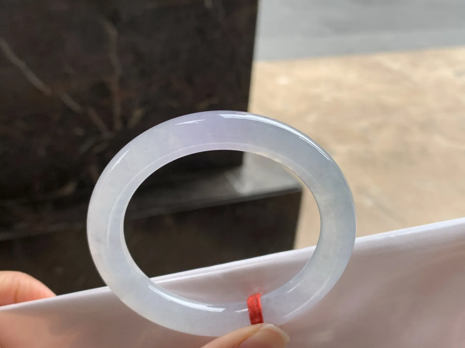 51.5-9

冰紫圆条手镯^_^透亮 水润