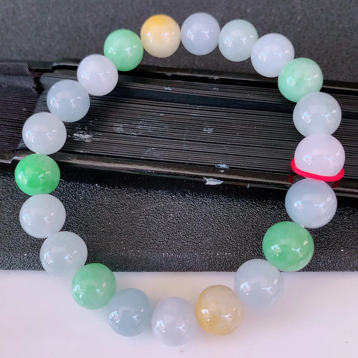 自然光实拍，冰润多宝翡翠手链，多彩翡翠手串，颜色丰富，料子细腻，高档大气，自戴送礼佳品！#46.7取一尺寸9.5