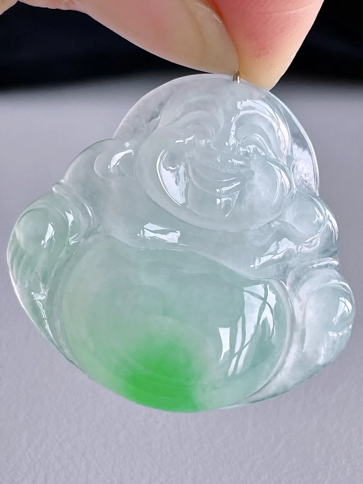 【裸石】高冰飘绿佛公吊坠
【说明】缅料 完美 性价比高  
【尺寸】32.6-34-6.5