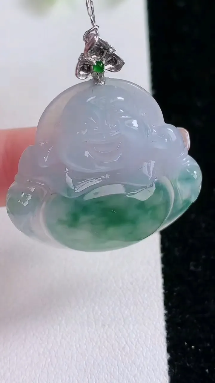 天然A货翡翠种飘花佛公吊坠，尺寸31.2-32.6-5.6，重量:9.10g
2月1日