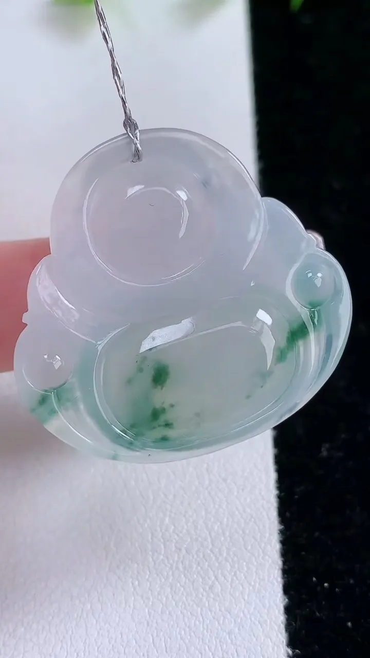 天然A货翡翠种飘花佛公吊坠，尺寸31-33-6.3，重量:10.28g
2月1日