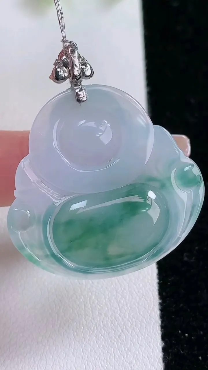 天然A货翡翠种飘花佛公吊坠，尺寸31.2-32.6-5.6，重量:9.10g
2月1日