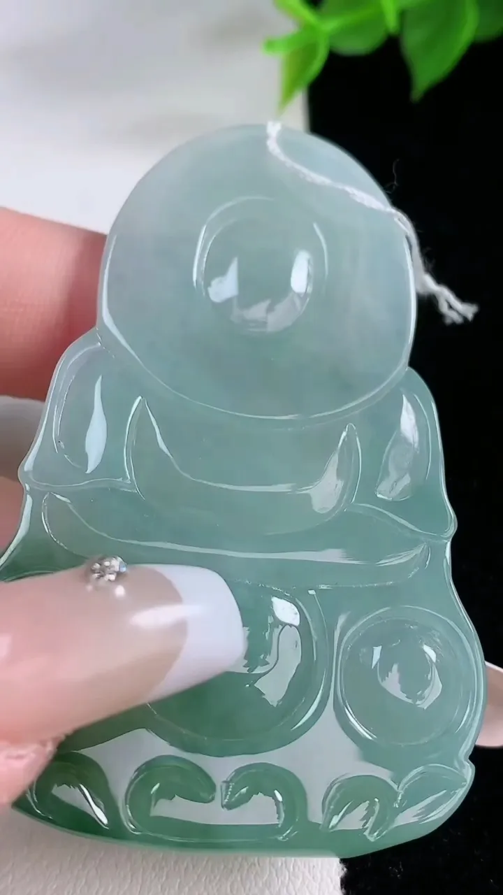 天然A货翡翠观音菩萨吊坠，尺寸60.2-38.2-5.6，重量:25.86g
2月3日