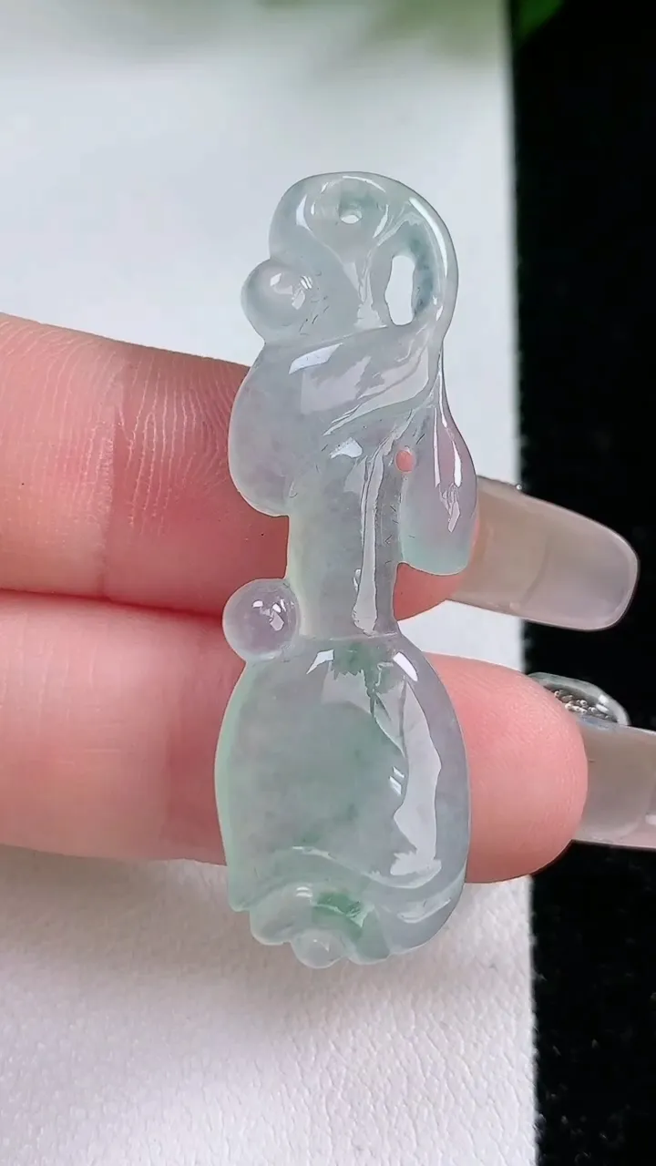 天然A货翡翠冰种飘花玉兰花吊坠，尺寸44.8-14-4.7，重:5.68g
2月4日