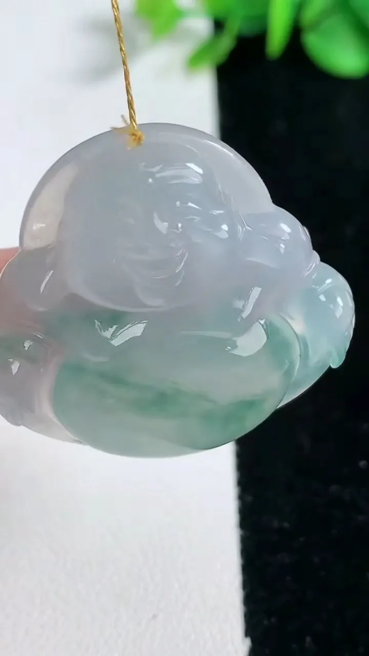 天然A货翡翠种飘花佛公吊坠，尺寸33-35.2-7.3，重量:12.71g
2月5日