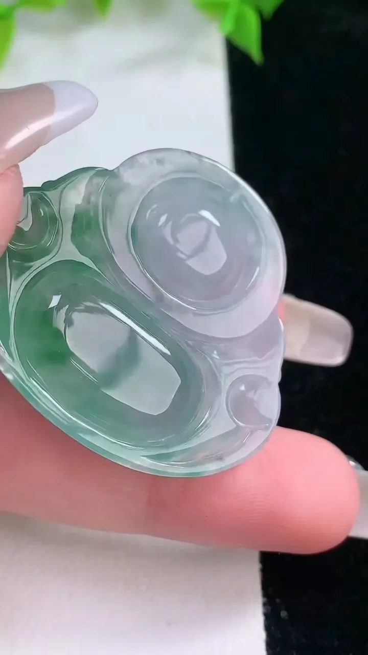 天然A货翡翠种飘花佛公吊坠，尺寸33.2-37-7，重量:12.67g
2月5日