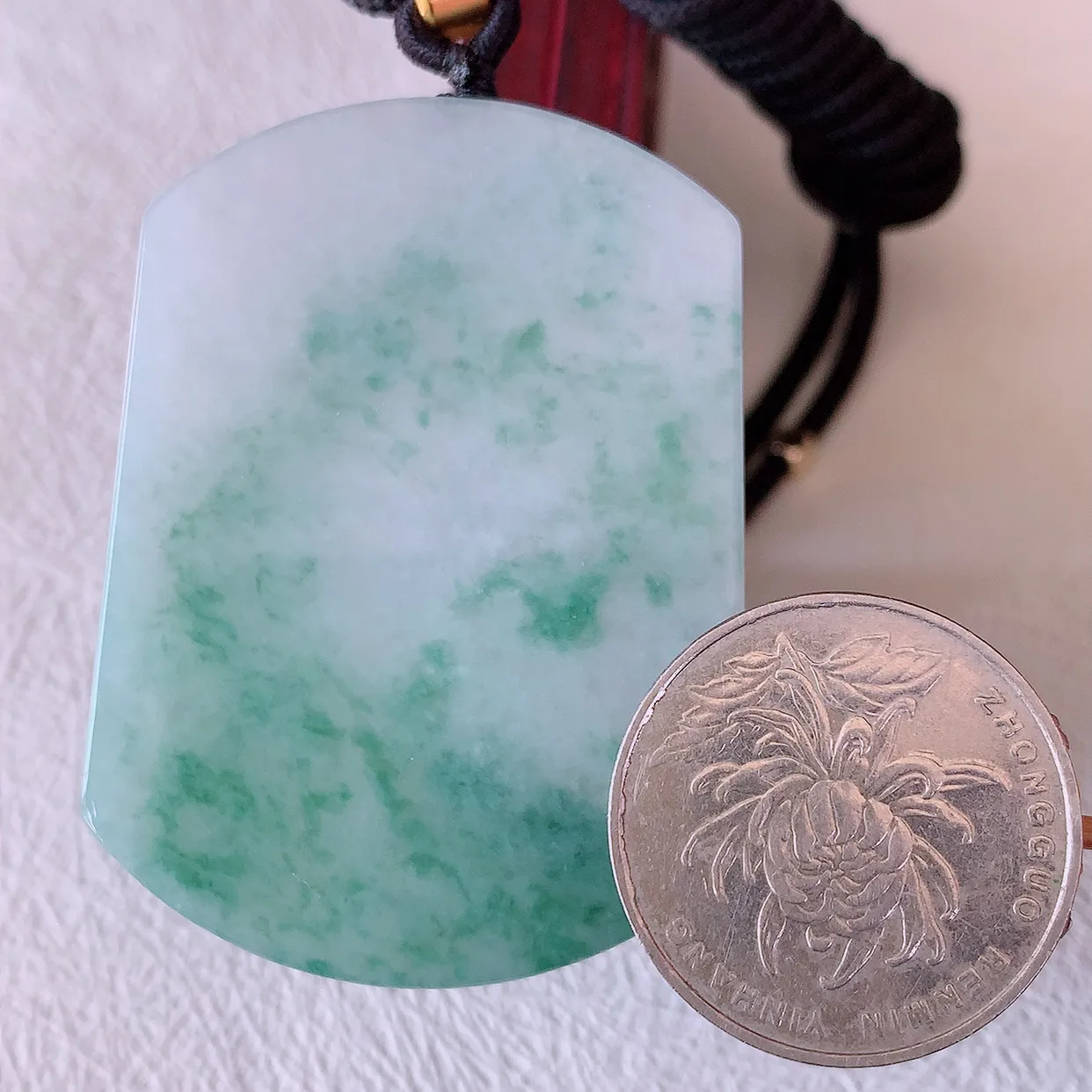 自然光实拍，冰润飘花翡翠平安无事牌吊坠，平平安安，无事 牌翠色灵动，佩戴平安时尚！#46.25