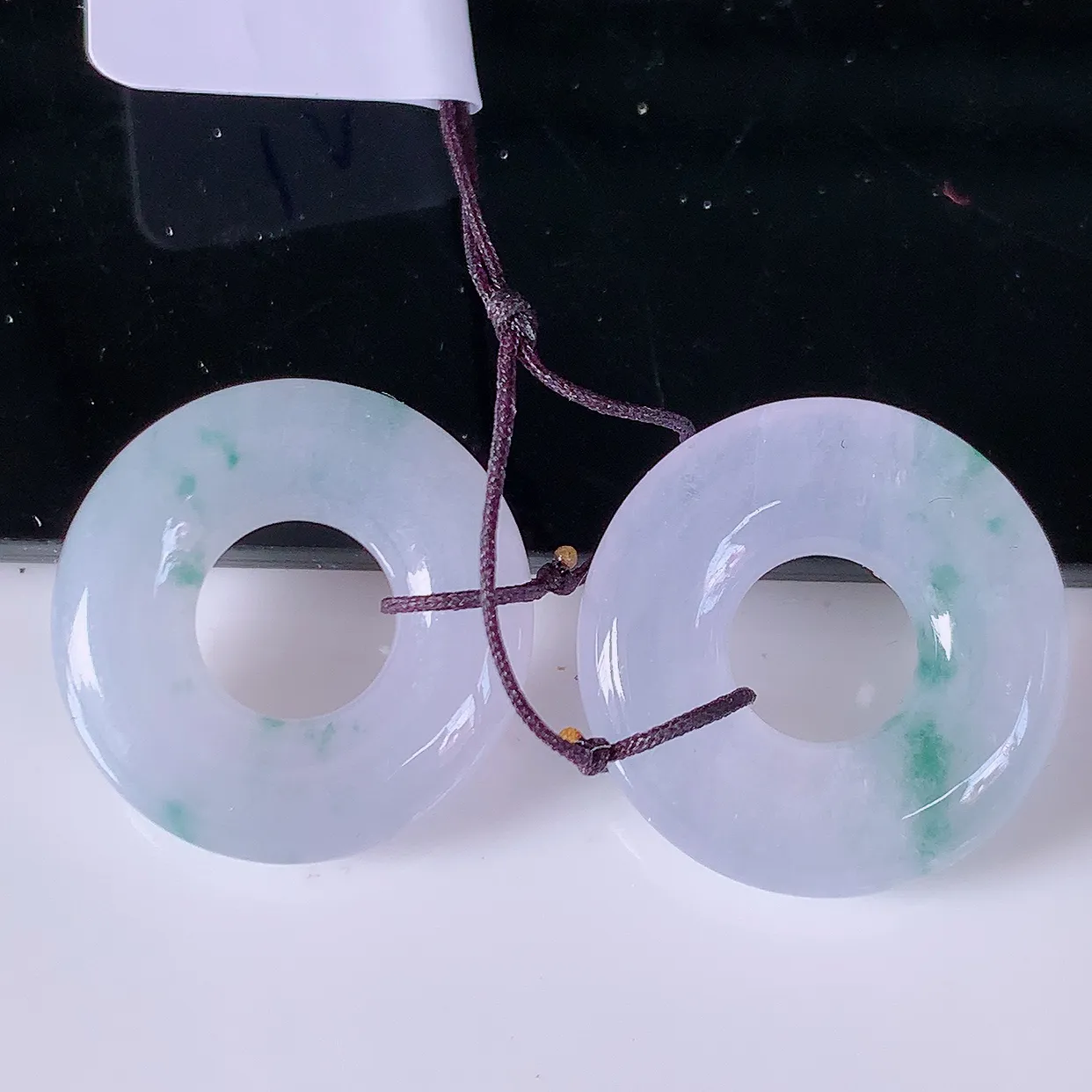 自然光实拍，冰种紫罗兰飘花翡翠一对平安扣耳坠，翠色灵动，玉质细腻，颜色漂亮，品相佳，佩戴佳品！配银线 #49.28