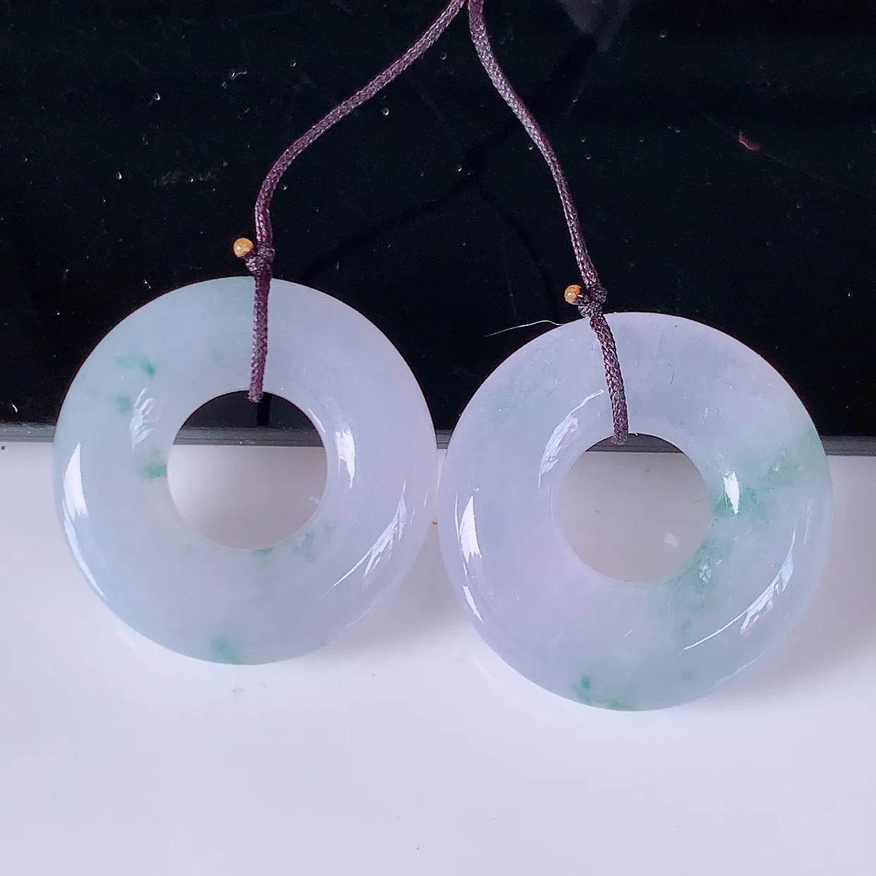 自然光实拍，冰种紫罗兰飘花翡翠一对平安扣耳坠，翠色灵动，玉质细腻，颜色漂亮，品相佳，佩戴佳品！配银线 #49.28