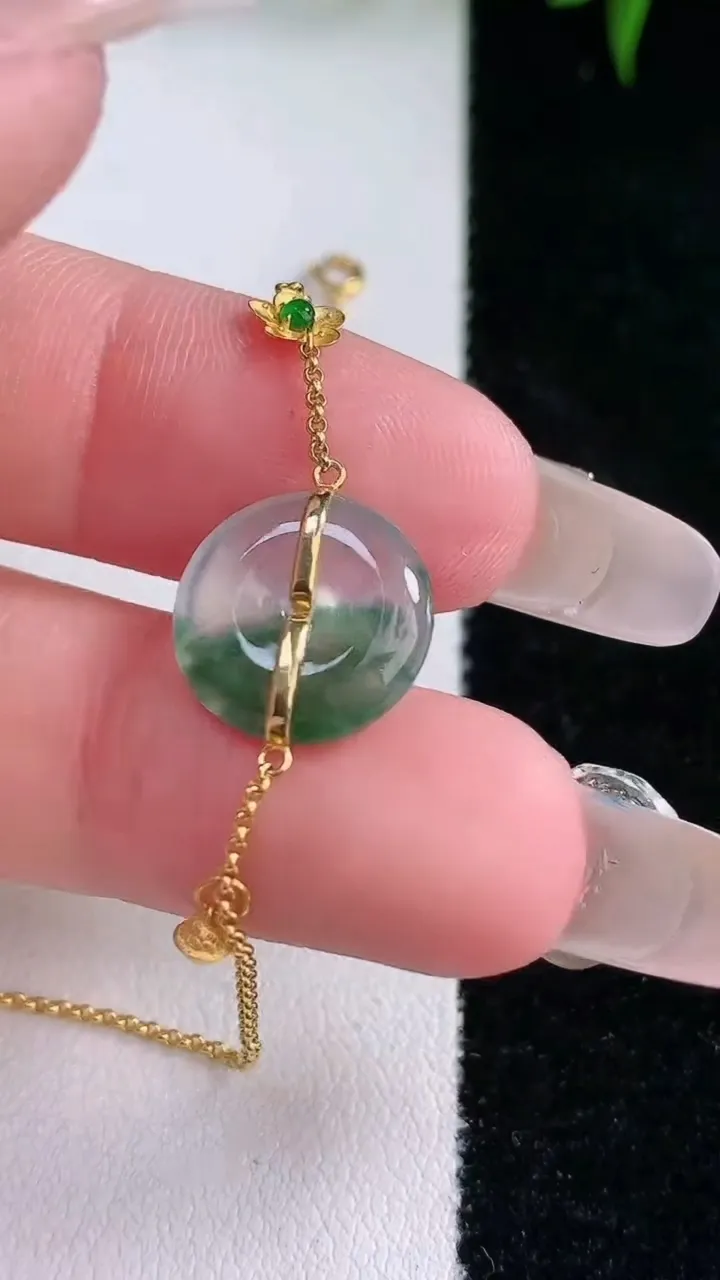 天然A货翡翠种飘花平安扣吊坠，尺寸12.4-3，重量:2.21g
3月4日