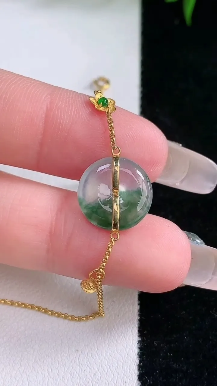 天然A货翡翠种飘花平安扣吊坠，尺寸12.4-3，重量:2.21g
3月4日