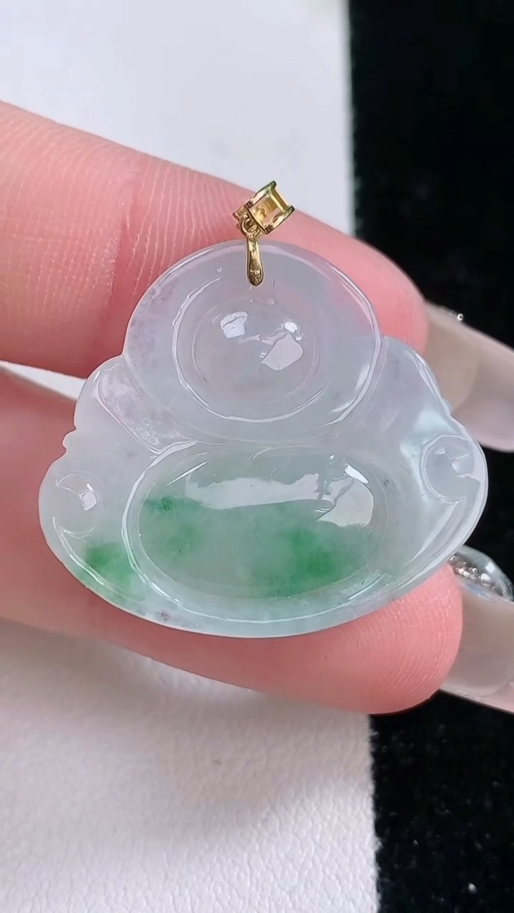 天然A货翡翠种飘花佛公吊坠，尺寸24-27.5-6，重量:5.69g
3月7日