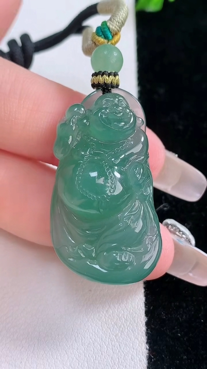 天然A货翡翠逍遥佛吊坠，尺寸34.5-20.6-10.6，重量:15.33g
3月7日