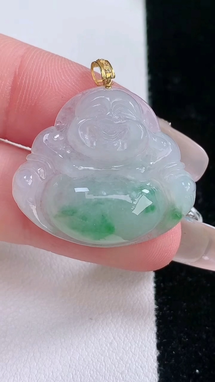 天然A货翡翠种飘花佛公吊坠，尺寸24-27.5-6，重量:5.69g
3月7日