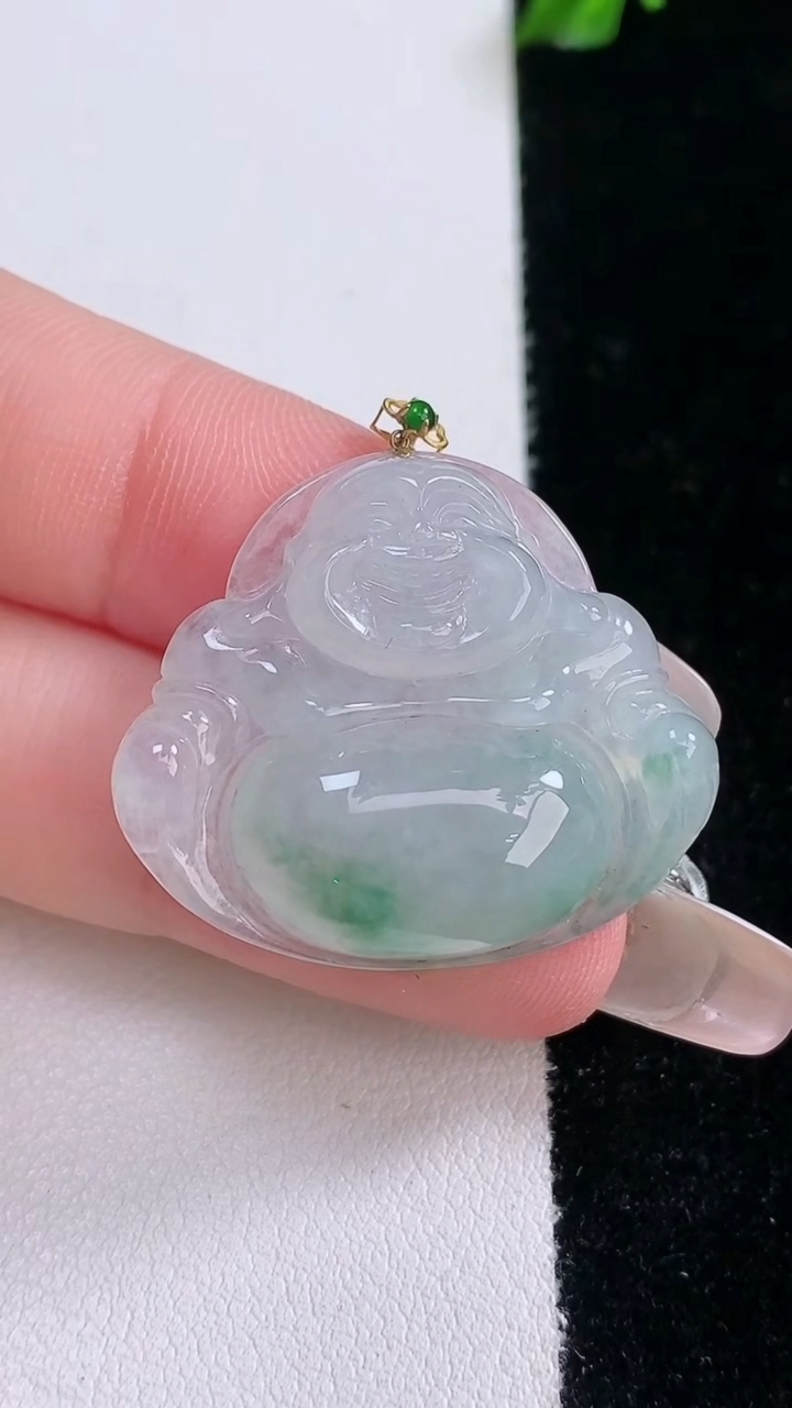 天然A货翡翠种飘花佛公吊坠，尺寸26-29.8-6，重量:6.67g
3月7日