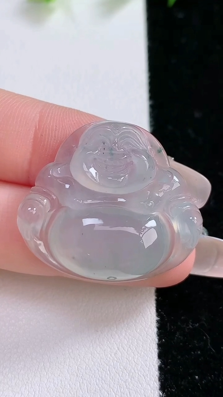 天然A货翡翠飘花佛公吊坠，尺寸27.5-31.3-7，重:8.90g
3月8日