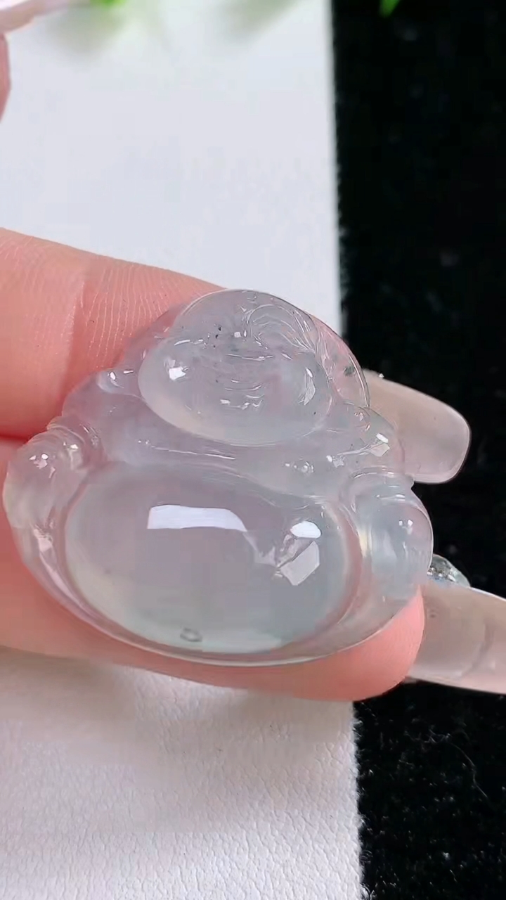 天然A货翡翠飘花佛公吊坠，尺寸27.5-31.3-7，重:8.90g
3月8日