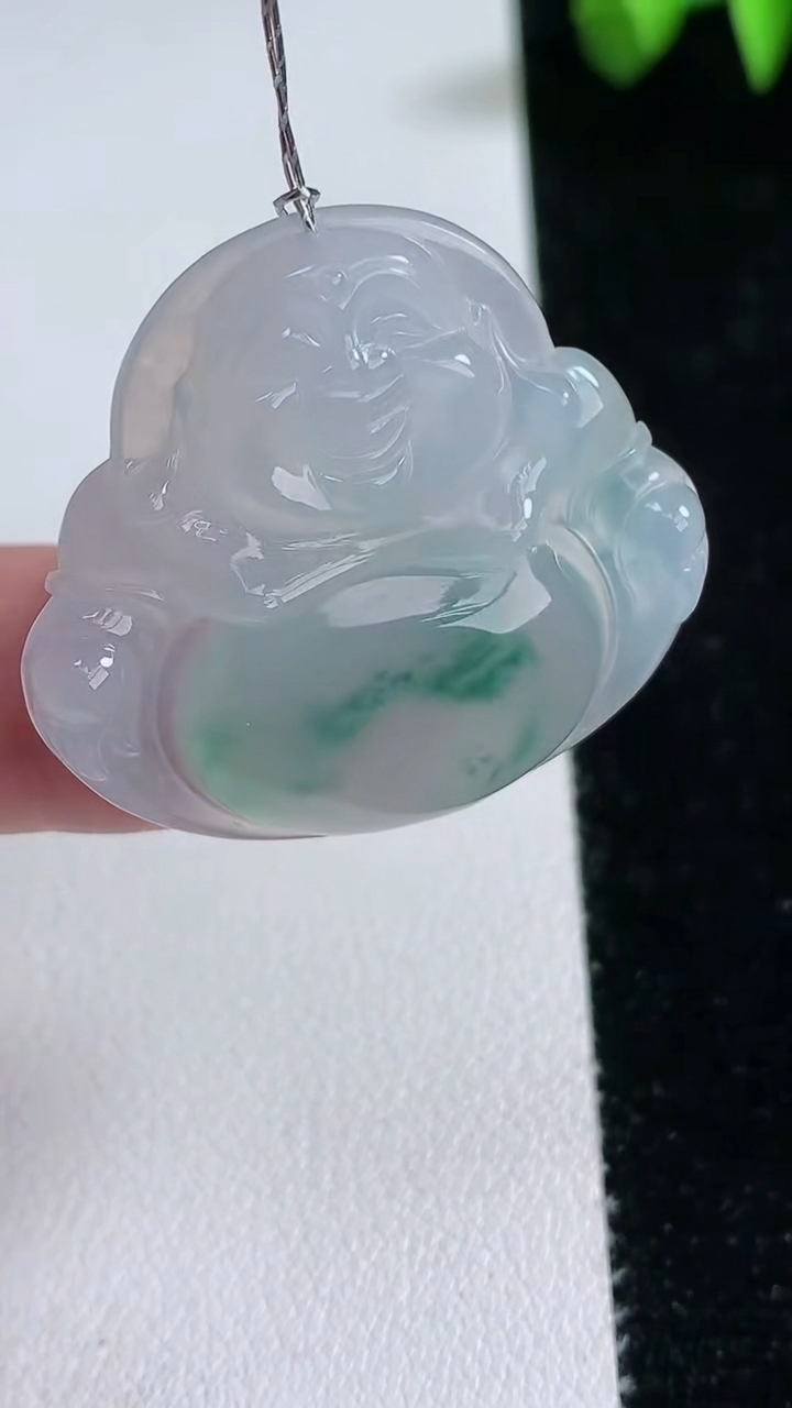 天然A货翡翠种飘花佛公吊坠，尺寸31.5-34.7-5.7，重量:9.82g
3月12日