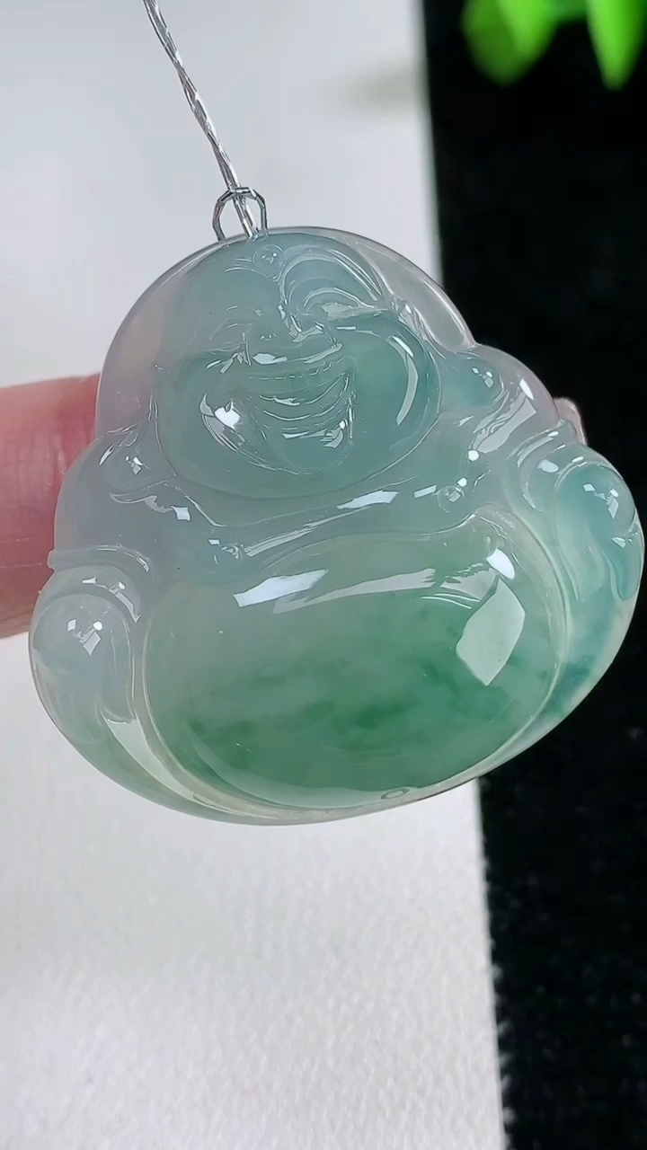 天然A货翡翠种飘花佛公吊坠，尺寸32.5-34.4-5.7，重量:11.50g
3月12日