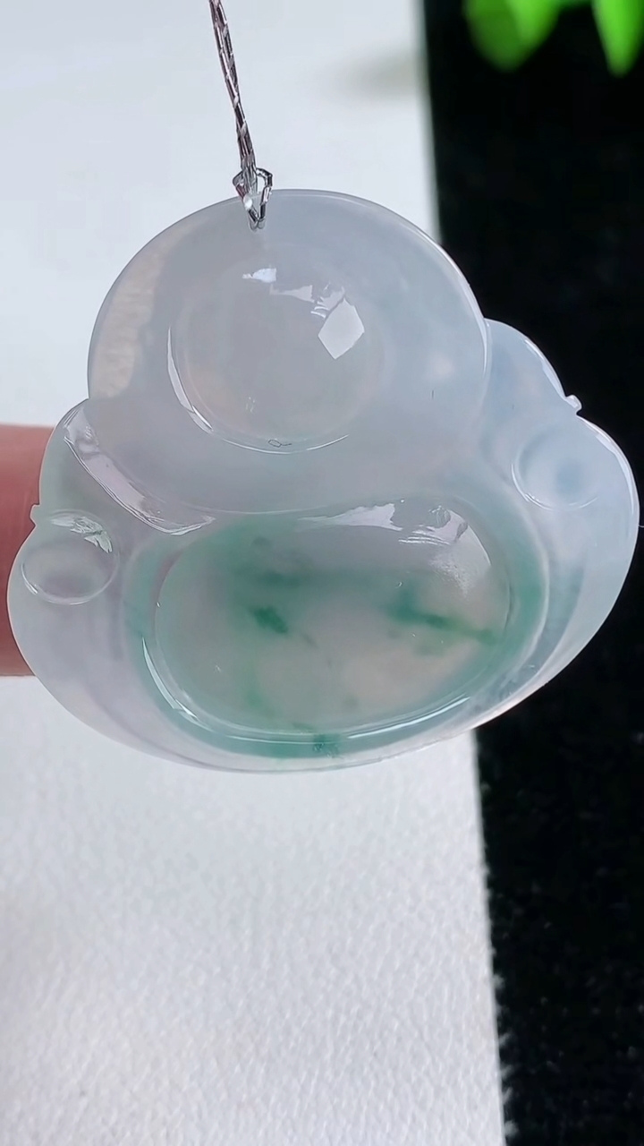 天然A货翡翠种飘花佛公吊坠，尺寸31.5-34.7-5.7，重量:9.82g
3月12日