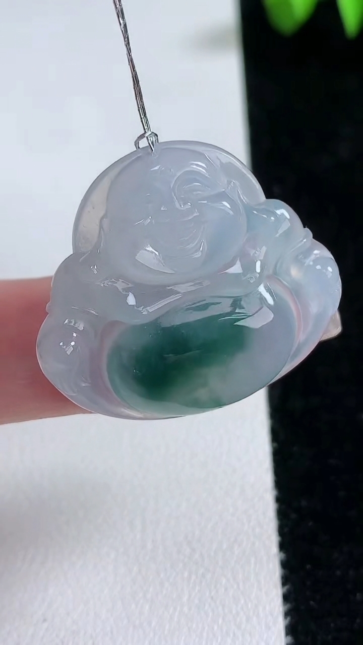 天然A货翡翠种飘花佛公吊坠，尺寸28.8-32.2-5.5，重量:7.84g
3月12日