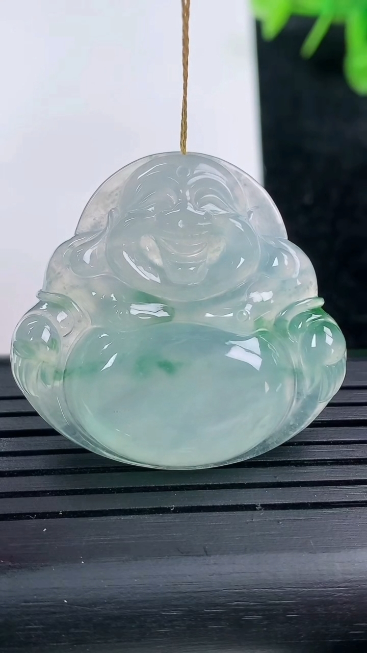 天然A货翡翠种飘花佛公吊坠尺寸33.7-35.6-5.9重量:11.50g
3月14日