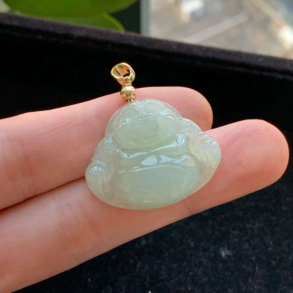 A货天然翡翠冰糯种925银底色佛公吊坠重量6.62
3月14日
