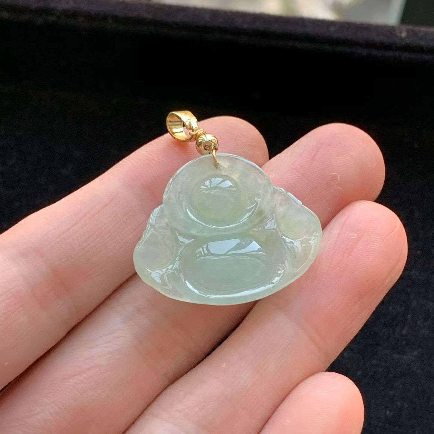 A货天然翡翠冰糯种925银底色佛公吊坠重量6.62
3月14日