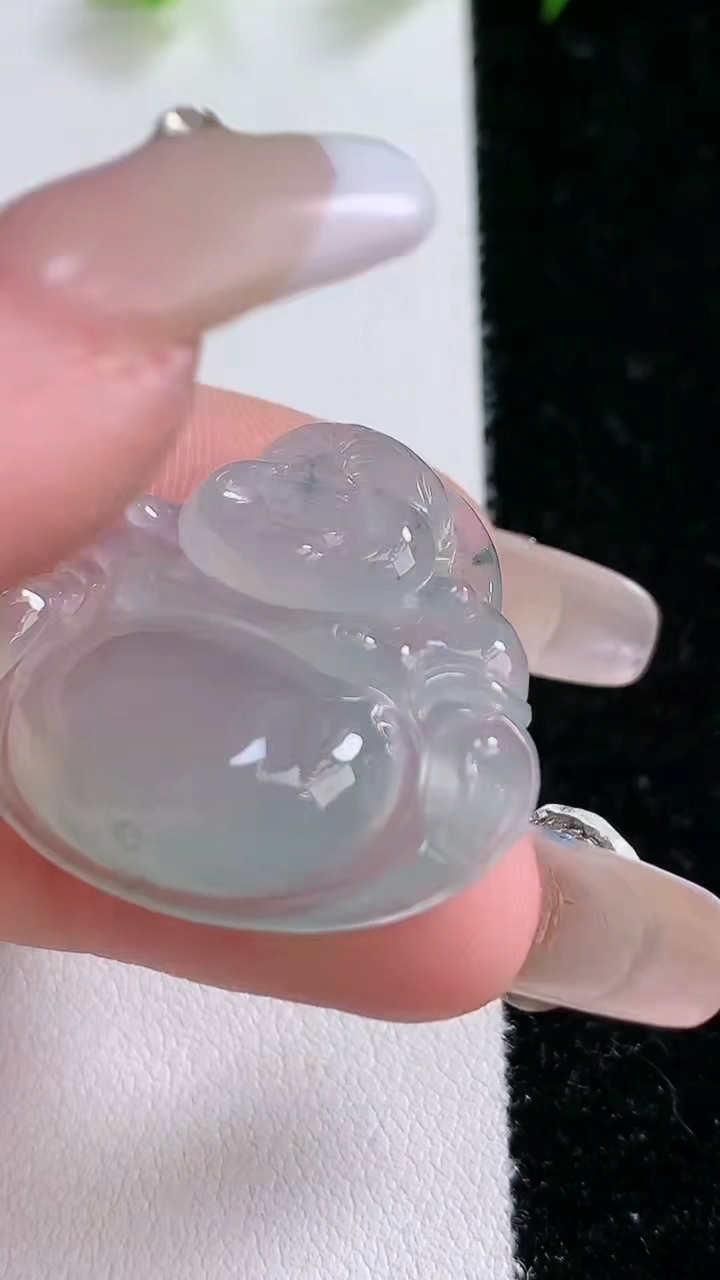 天然A货翡翠飘花佛公吊坠，尺寸27.5-31.3-7，重:8.90g
3月14日