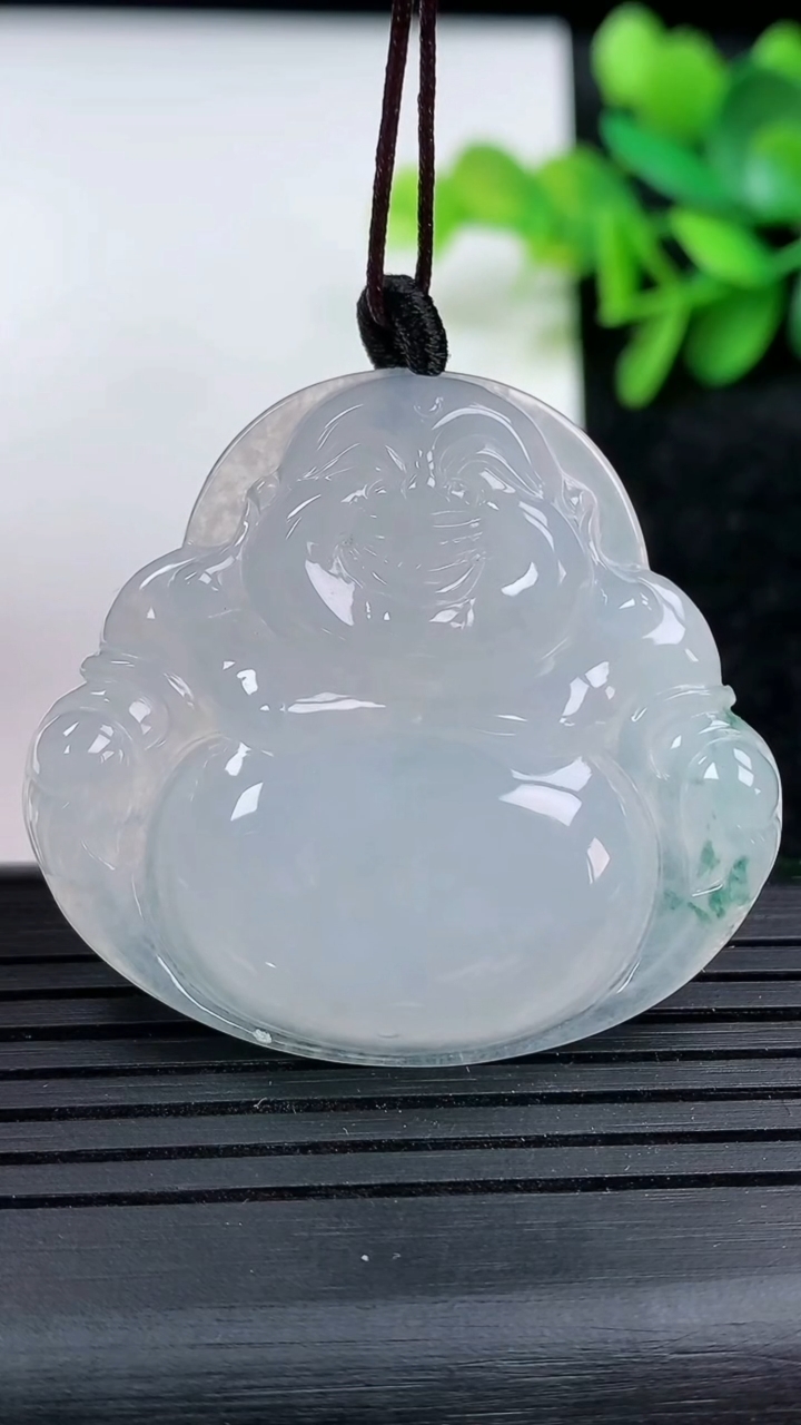 天然A货翡翠冰种飘花佛公吊坠尺寸37.4-40.4-5.6重量:13.76g
3月15日