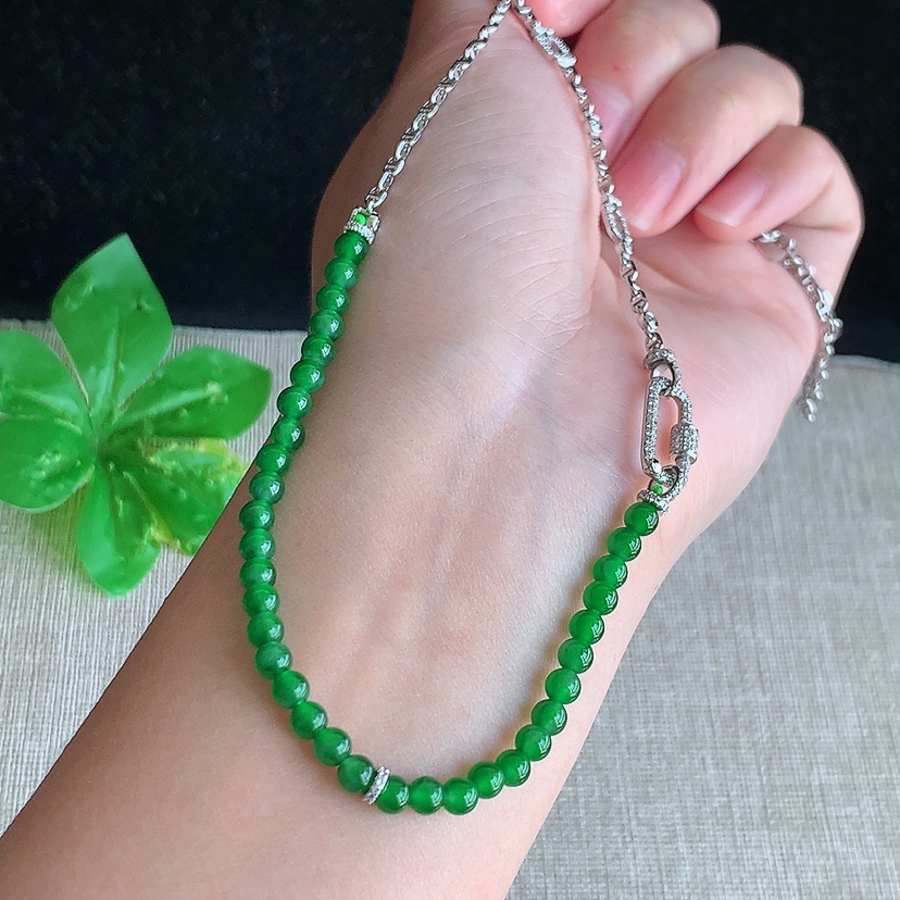 天然A货翡翠18K金伴钻镶嵌满绿圆珠项链毛衣链 
尺寸3.5mm 重量8.96g 0314
