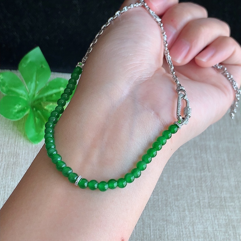 天然A货翡翠18K金伴钻镶嵌满绿圆珠项链毛衣链 
尺寸3.5mm 重量8.96g 0314