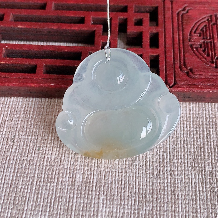 天然A货翡翠飘黄翡佛公吊坠 
尺寸27.2-30.2-5.7mm 重量7.65g 0315