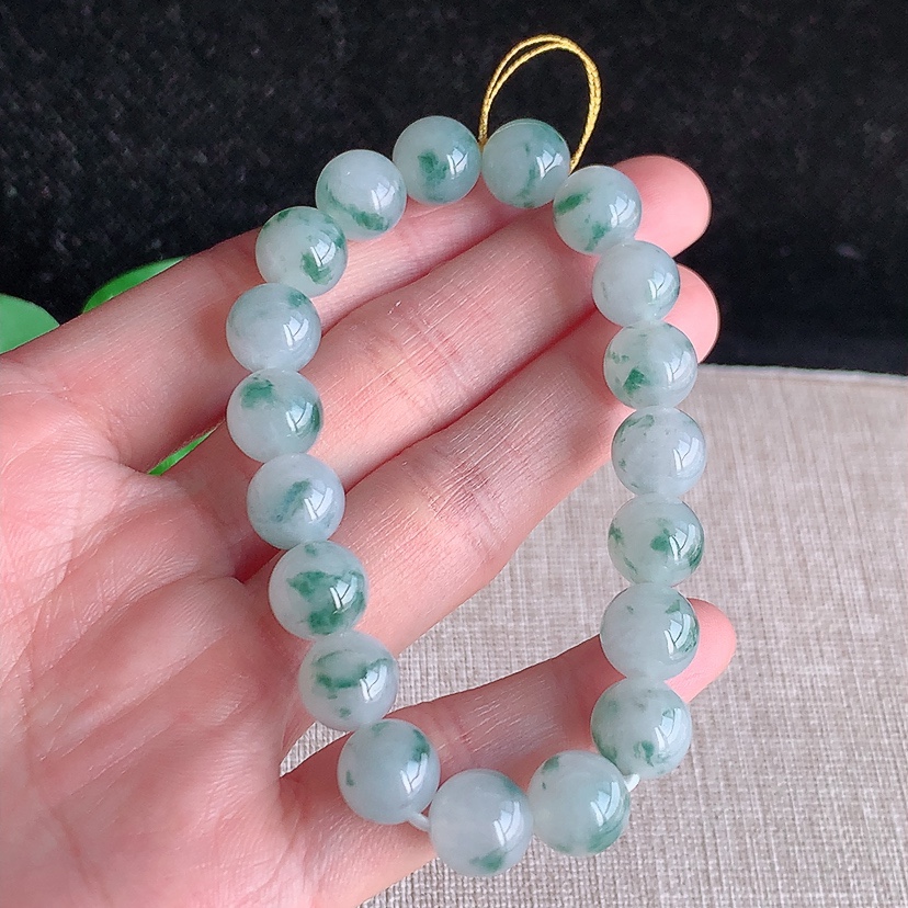 天然A货翡翠飘花圆珠佛珠手串19颗 
尺寸9.6mm 重量32.62g 0315