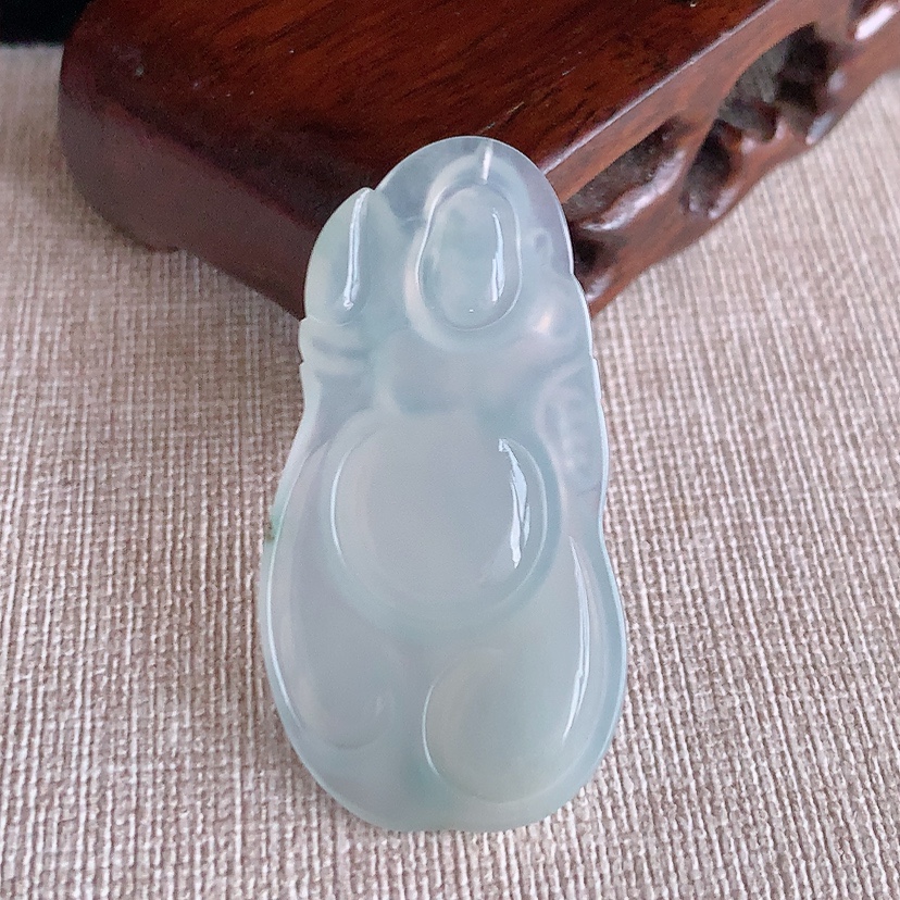 天然A货翡翠飘花布袋佛吊坠 
尺寸46-24.3-5mm 重量9.84g 0317