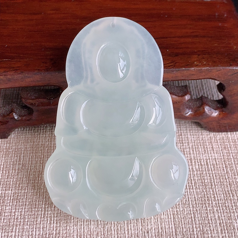 天然A货翡翠晴水正装观音吊坠 
尺寸51.7-36-6mm 重量19.53g 0317