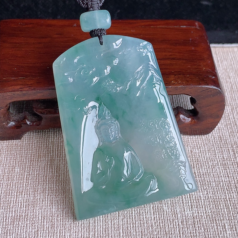 天然A货翡翠飘花一刀切山水观音吊坠 
尺寸56.3-40-6mm 重量37.38g 0320