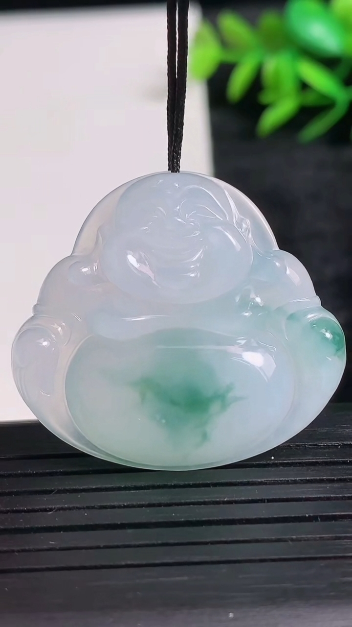 天然A货翡翠冰种飘花佛公吊坠，尺寸31.4-35.3-6.1重量:10.94g
3月24日