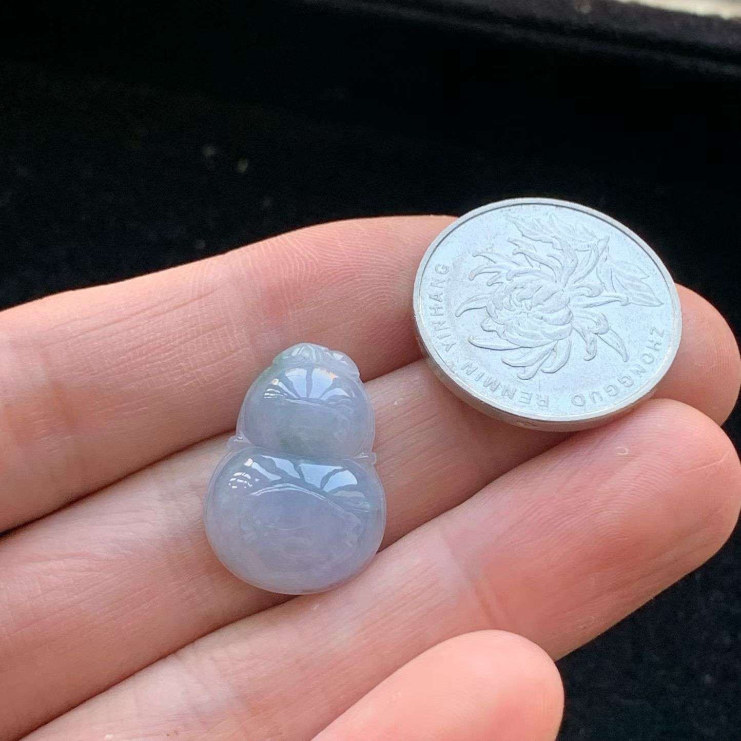 A货天然翡翠冰糯种飘花紫罗兰葫芦吊坠重量3.33
3月25日