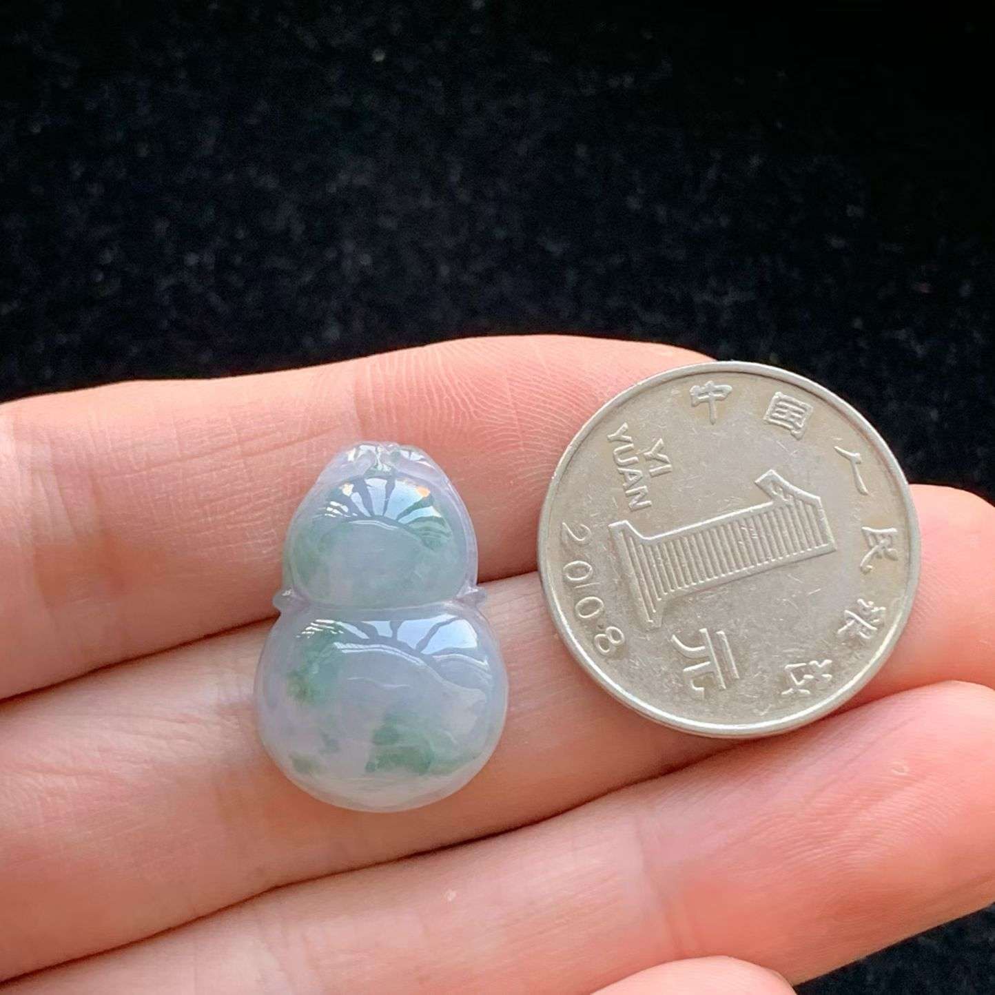 A货天然翡翠冰糯种飘花紫罗兰葫芦吊坠重量5.91
3月25日