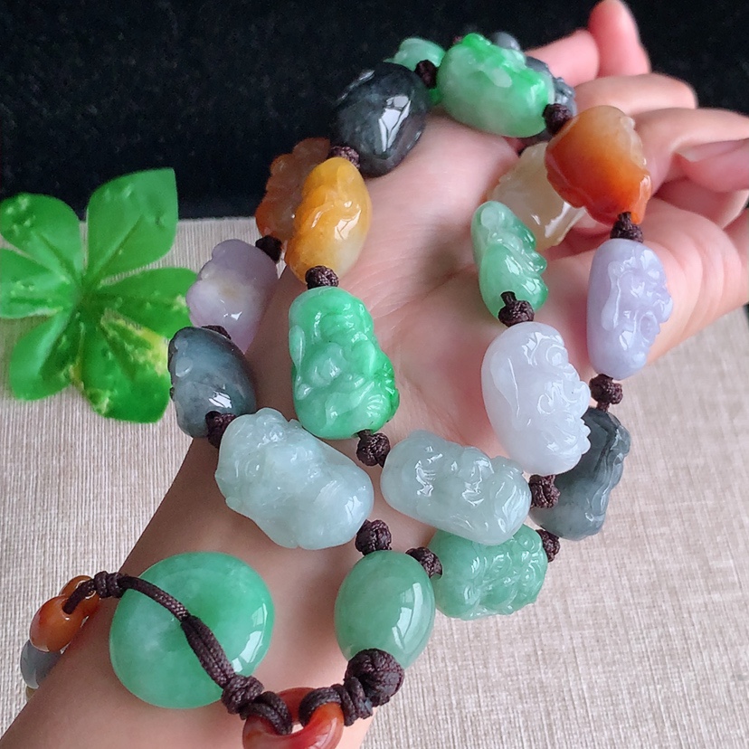 天然A货翡翠多彩十八罗汉项链毛衣链18颗 
尺寸26-17-14.8mm 重量192.32g 0328