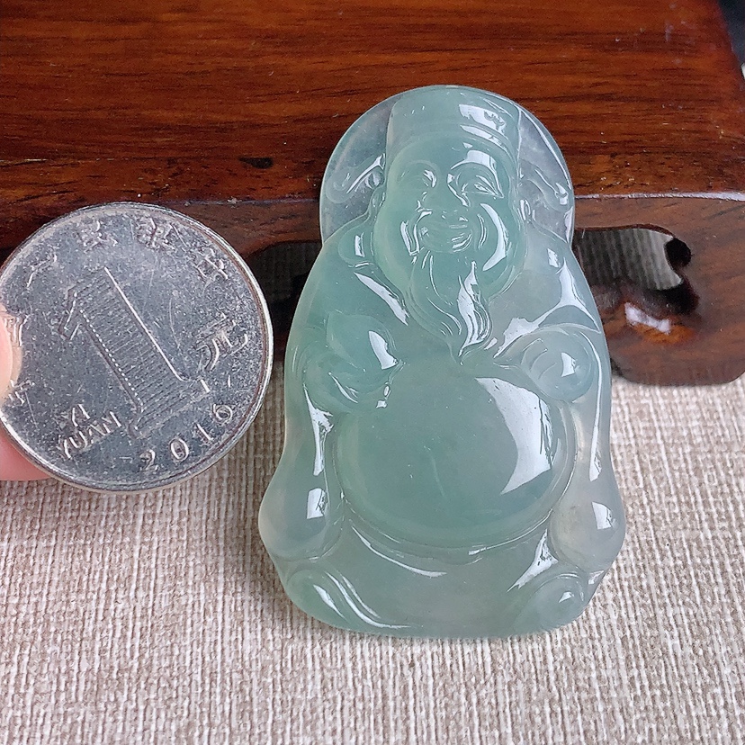天然A货翡翠晴水财神爷吊坠 
尺寸48-31.4-5.5mm 重量15.00g 0329