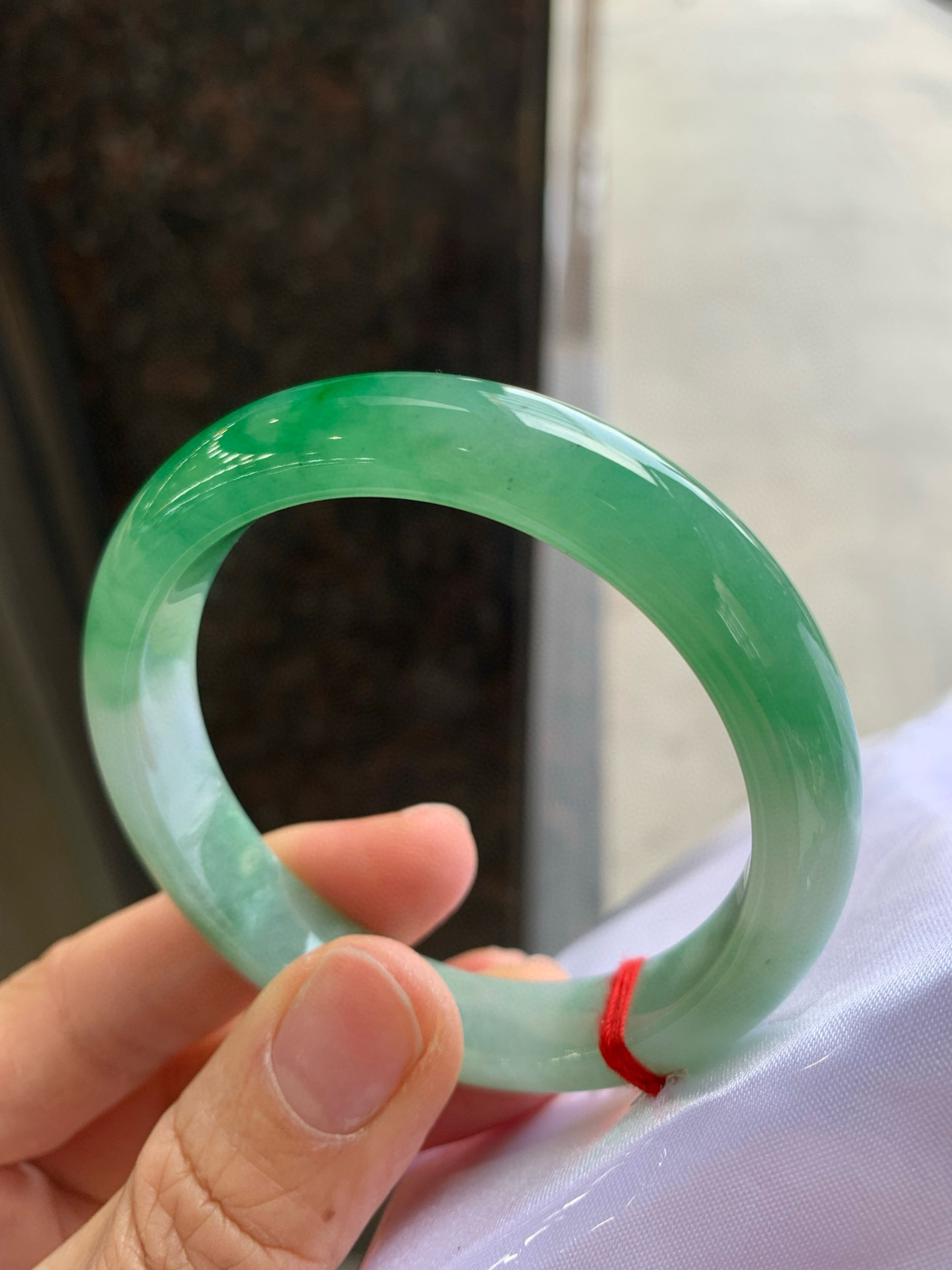 正圈飘绿 有纹 尺寸：54.2/10.9/7.8 色辣