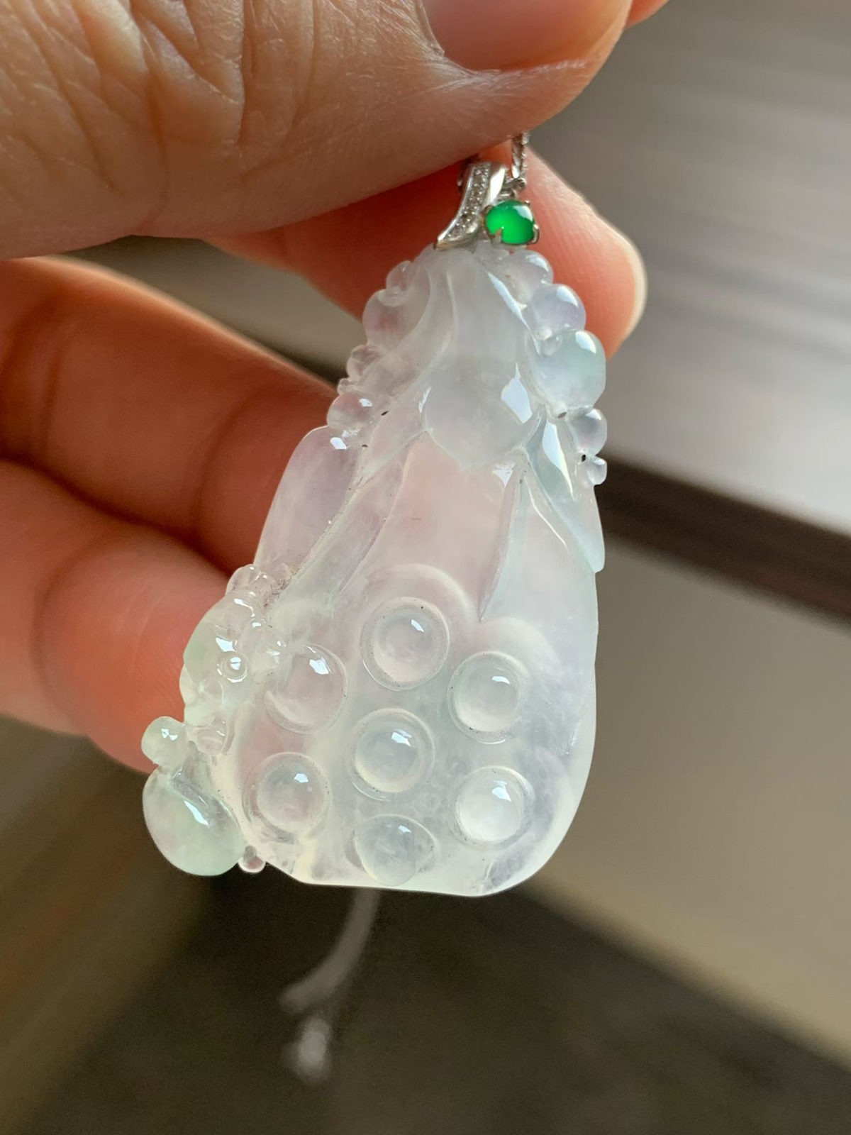 冰莲蓬吊坠

裸石38*22.5*8.2 整体长度42mm
18k金钻石扣头