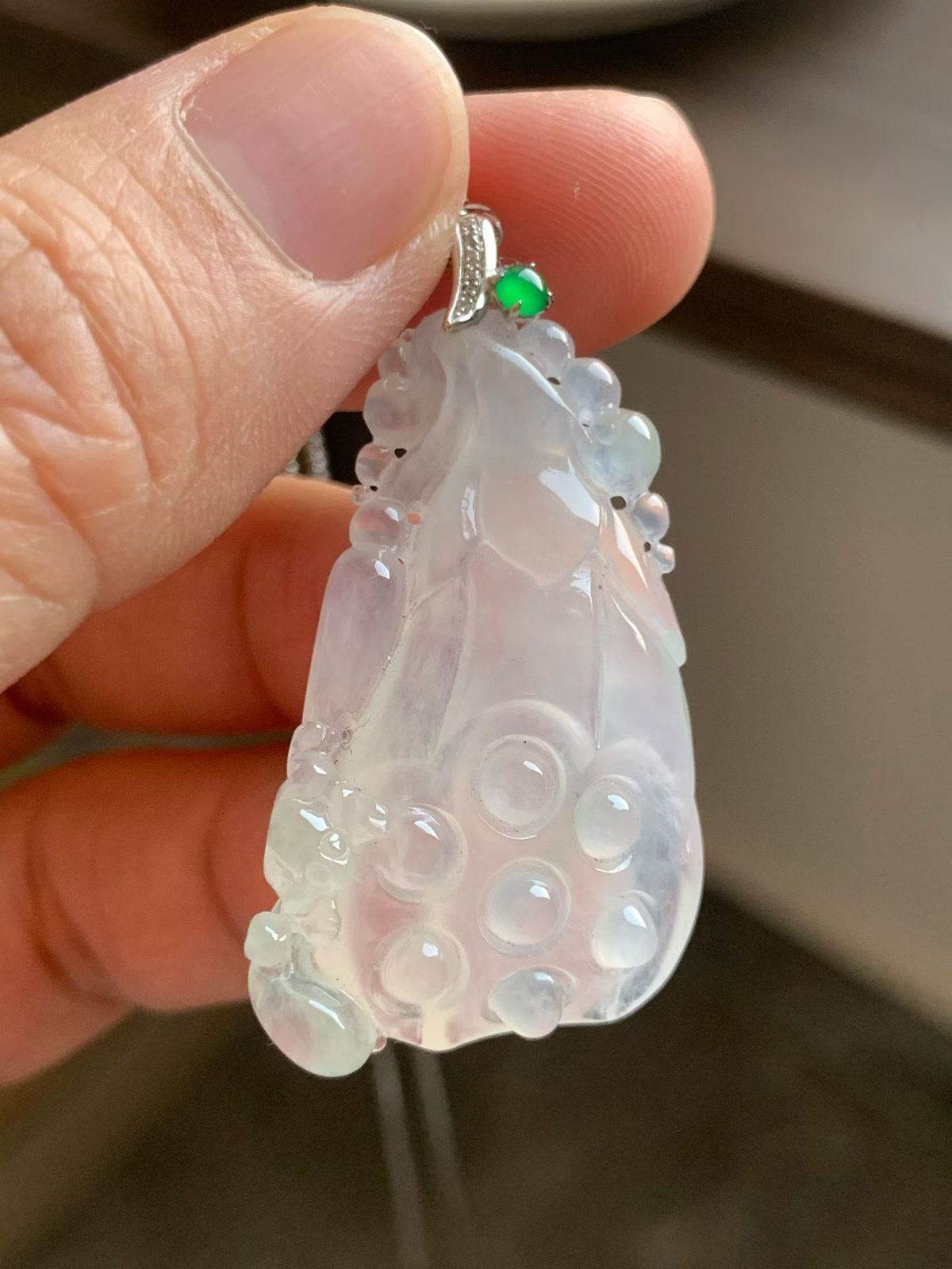 冰莲蓬吊坠

裸石38*22.5*8.2 整体长度42mm
18k金钻石扣头